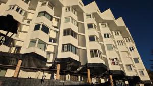 Bygningen som lejligheden ligger i + 13 billeder