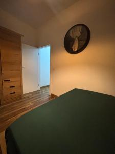 Giường trong phòng chung tại Apart Dino +7 ảnh