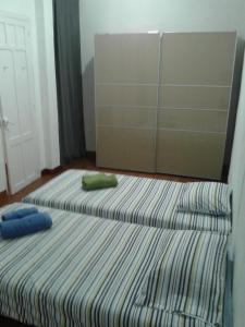 Łóżko lub łóżka w pokoju w obiekcie Marina La Concha
