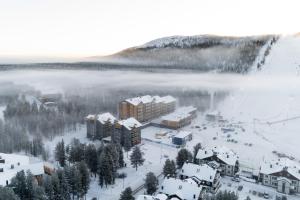 an aerial view of a resort in the snow at Le Chalet Lingonberry D14 Ski-in Ski-out by Aavalevi in Levi