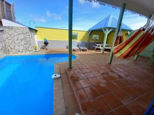 Πισίνα στο ή κοντά στο Villa Dezi F3 avec piscine