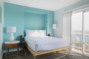 Ένα ή περισσότερα κρεβάτια σε δωμάτιο στο WorldMark Anaheim +14 φωτογραφίες