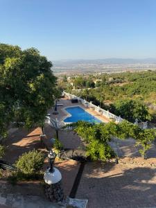 an overhead view of a swimming pool in a yard at Bronlara in Alhaurín de la Torre
