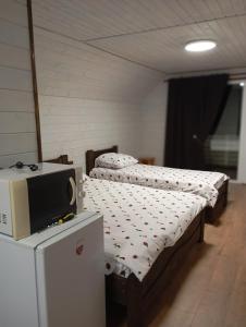 Ένα ή περισσότερα κρεβάτια σε δωμάτιο στο Шепіт лісу