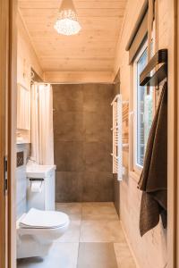 Ένα μπάνιο στο Sosnowy Raj domki nad Wkrą