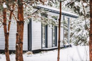 Το Sosnowy Raj domki nad Wkrą τον χειμώνα