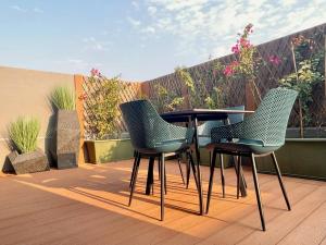 En balkon eller terrasse på C Living - Executive - AQIQ