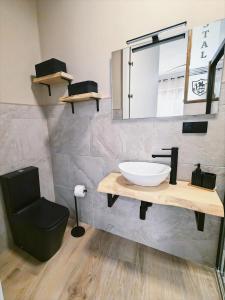 Ванная комната в Hostal La Casa Del Escudo +2 фотографии