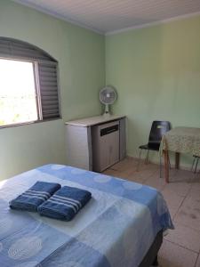 Ένα ή περισσότερα κρεβάτια σε δωμάτιο στο Pousada Flor e Ser +7 φωτογραφίες