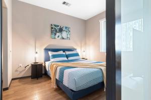 Ένα ή περισσότερα κρεβάτια σε δωμάτιο στο Modern 2BR/2BA in Irvine Pool & Gym +27 φωτογραφίες