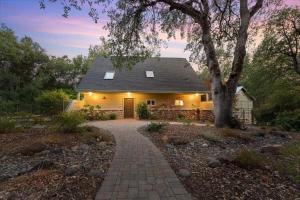 a house with a pathway leading to it at Montgomery Ranch - Main House in Redding