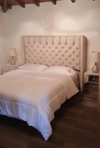 En eller flere senge i et værelse på Villa marinilla