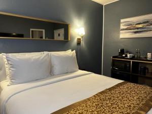 Ένα ή περισσότερα κρεβάτια σε δωμάτιο στο Hotel TB Downtown Miami