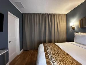 Ένα ή περισσότερα κρεβάτια σε δωμάτιο στο Hotel TB Downtown Miami