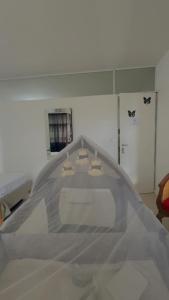 a plastic table in a room with a room with a room at YouHouse Paraná in Buenos Aires +3 photos