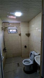 Phòng tắm tại Hotel Palm Gonio