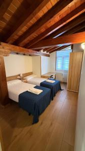 Ένα ή περισσότερα κρεβάτια σε δωμάτιο στο Apartamentos La Solana