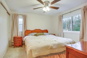 a bedroom with a bed and a ceiling fan at 4 Mi to Bromley Mtn Family-Friendly Retreat! in Landgrove Town Center
