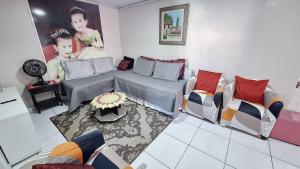 Χώρος καθιστικού στο CASA TOP de 2 quartos em TORRES-RS - na mais bela praia Gaúcha - Cozinha - Banheiro - Ar-condicionado split em cada quarto- Smart TV 32' - Wi-Fi- Estacionamento - Anfitriã Superhost no BnB +37 φωτογραφίες