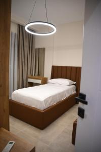 Ένα ή περισσότερα κρεβάτια σε δωμάτιο στο Urban Comfort Apartment