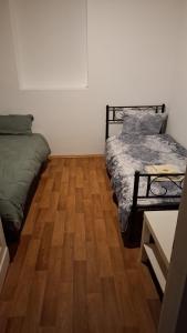 Postel nebo postele na pokoji v ubytování Zwei separate Zimmer im 1 OG Ideal für Montüeren oder Studenten WG