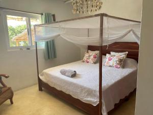 Ένα ή περισσότερα κρεβάτια σε δωμάτιο στο Casa dos Tim