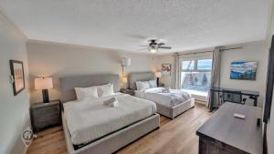 Ένα ή περισσότερα κρεβάτια σε δωμάτιο στο Rocky Mountain Condos by StayIn +13 φωτογραφίες