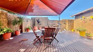 En balkon eller terrasse på Greenshields Park Guesthouse