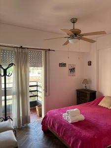 Ένα ή περισσότερα κρεβάτια σε δωμάτιο στο Apart familiar - pasos de Oroño - Cerca de todo!