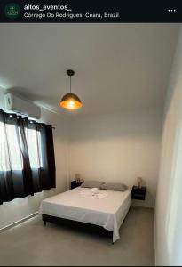 Ένα ή περισσότερα κρεβάτια σε δωμάτιο στο Da terra Altos