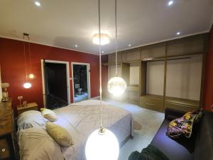 a bedroom with two beds and two lights at Hilltop Villa Chez Coco in Rodney Bay Village