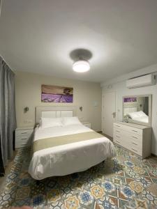 Ένα ή περισσότερα κρεβάτια σε δωμάτιο στο Hostal el Ciervo