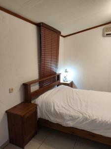 Ένα ή περισσότερα κρεβάτια σε δωμάτιο στο galilpitality