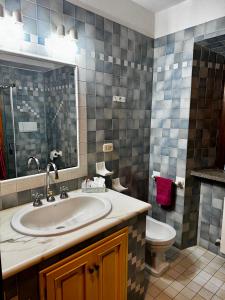 Et badeværelse på Appartamento Kira