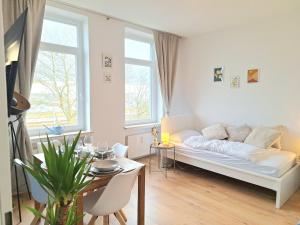 Et opholdsområde på Harbour Pearl 2 Room Apartment and Kitchen