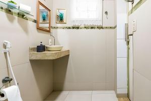 Phòng tắm tại Casa Aconchegante