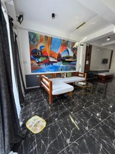 Posezení v ubytování Dajon-6 Family Suite + 1 fotografie