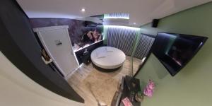 Ένα μπάνιο στο Hotel Motel Paradiso - Cruz Alta-RS