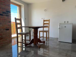 Η κουζίνα ή μικρή κουζίνα στο Zerko Holiday Apartment MARJETKA with WELLNESS bookable separately