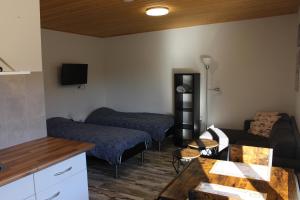 Μια τηλεόραση ή/και κέντρο ψυχαγωγίας στο Åsele Camping and Holliday homes