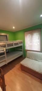 Ένα ή περισσότερα κρεβάτια σε δωμάτιο στο Zlatna Guest House