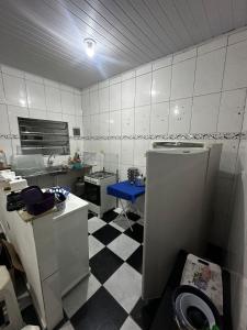 Η κουζίνα ή μικρή κουζίνα στο Casa na Praia veraneio fim de semana e temporada