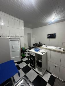 Η κουζίνα ή μικρή κουζίνα στο Casa na Praia veraneio fim de semana e temporada