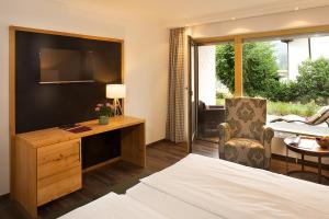 Postel nebo postele na pokoji v ubytování Hotel Menning ***S