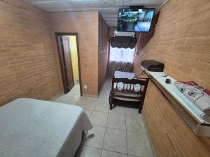 Et tv og/eller underholdning på Suite 2 ambientes AR na área central para 2 ou 3 pessoas-202A