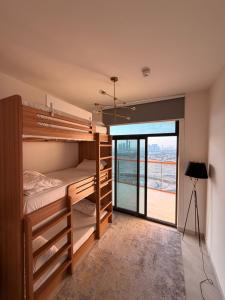 Ένα ή περισσότερα κρεβάτια σε δωμάτιο στο Magra CHILL SPOT HOSTEL +7 φωτογραφίες