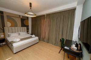 Ένα ή περισσότερα κρεβάτια σε δωμάτιο στο Luz&LukRooms