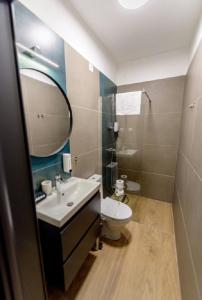 Ένα μπάνιο στο Luz&LukRooms