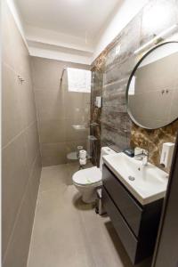 Ένα μπάνιο στο Luz&LukRooms