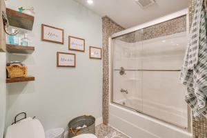 a bathroom with a shower and a toilet at Hot Tub, Trails, Views! Little River Retreat in Sunshine +27 photos